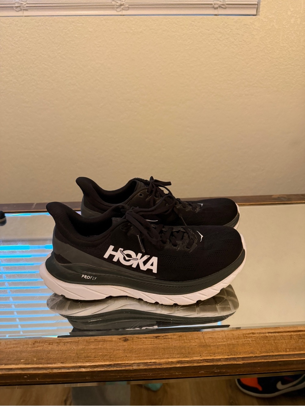 Hoka Men's Black and White Clifton-style Running Shoes